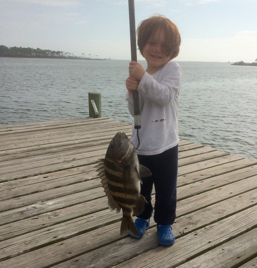 child with a sheepshead